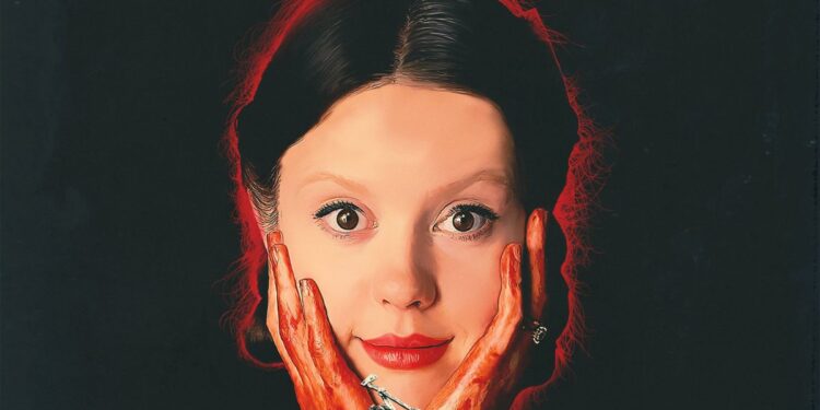 Mia Goth, holding bloody hands to her face while smiling, as Pearl, in the poster for Pearl.