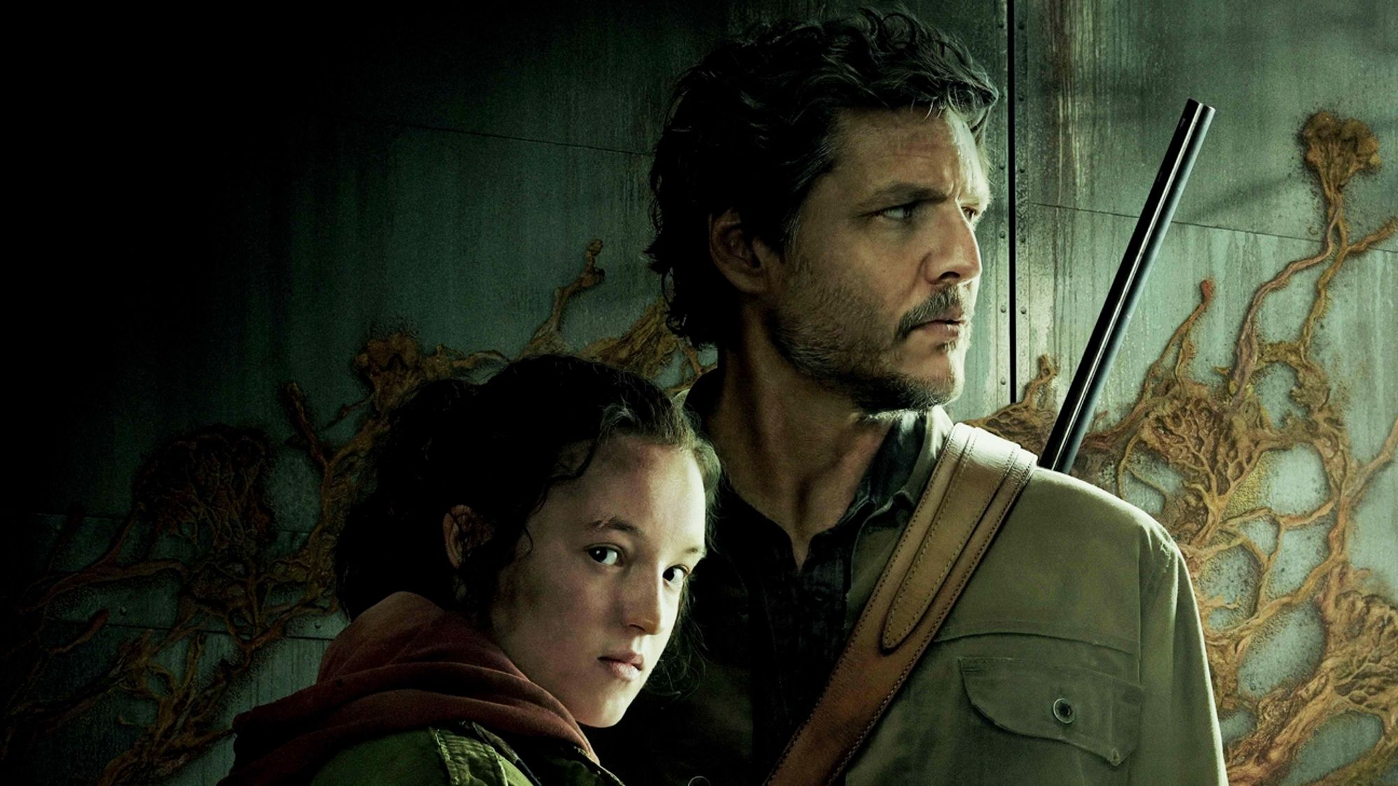 (من اليسار إلى اليمين) بيلا رامزي وبيدرو باسكال أمام أحشاء مصاب في ملصق The Last of Us
